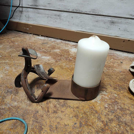 Horseshoe cowboy candle holder